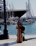 Man Playing a kind of Harp 1, Cartagena, Spain.jpg