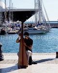 Man Playing a kind of Harp 2, Cartagena, Spain.jpg